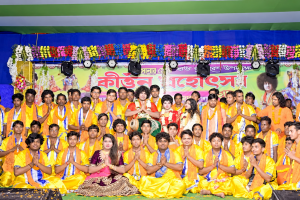 Garlanded Group Celebration on Stage